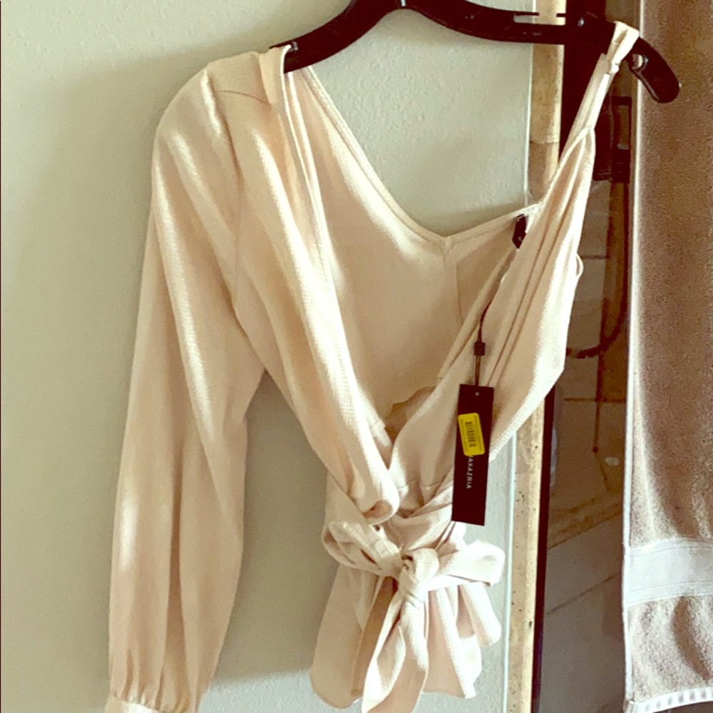 Adorable Asymmetrical sleeved top